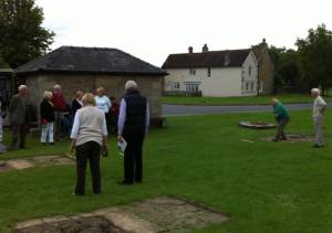 Phil Oliver tries his hand with a watching crowd